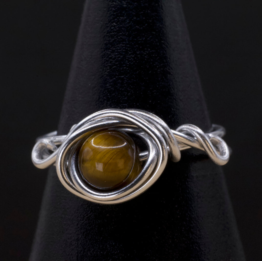 Anello in occhio di tigre | intreccio argentato