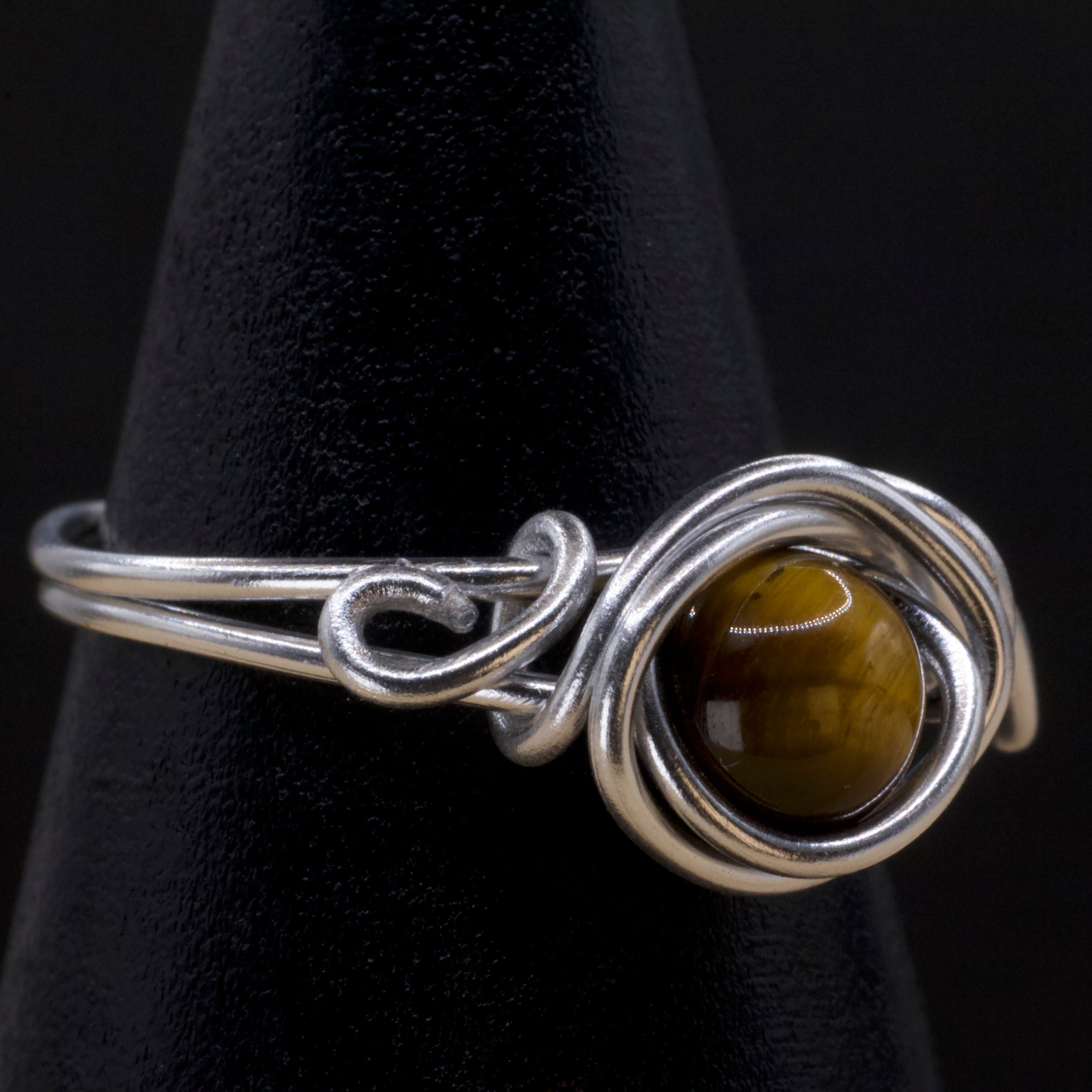 Anello in occhio di tigre | intreccio argentato