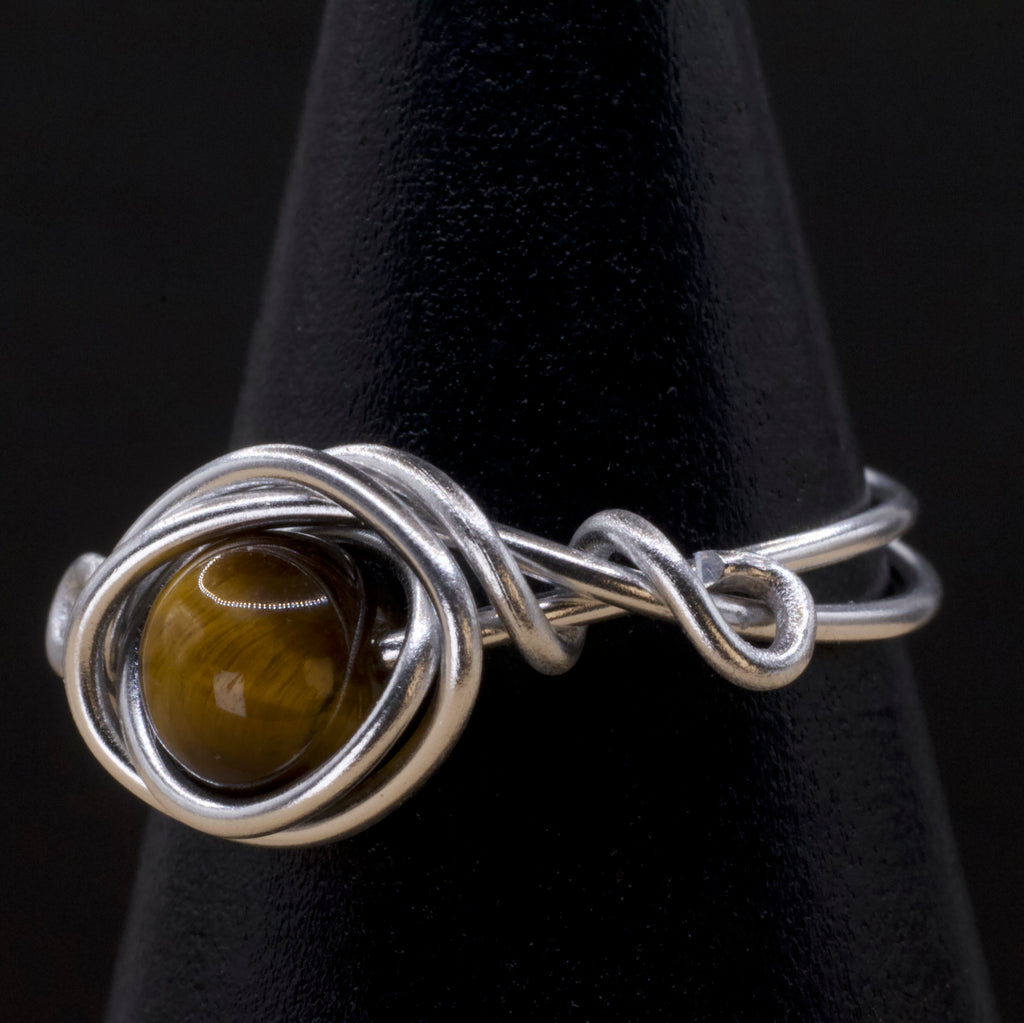 Anello in occhio di tigre | intreccio argentato