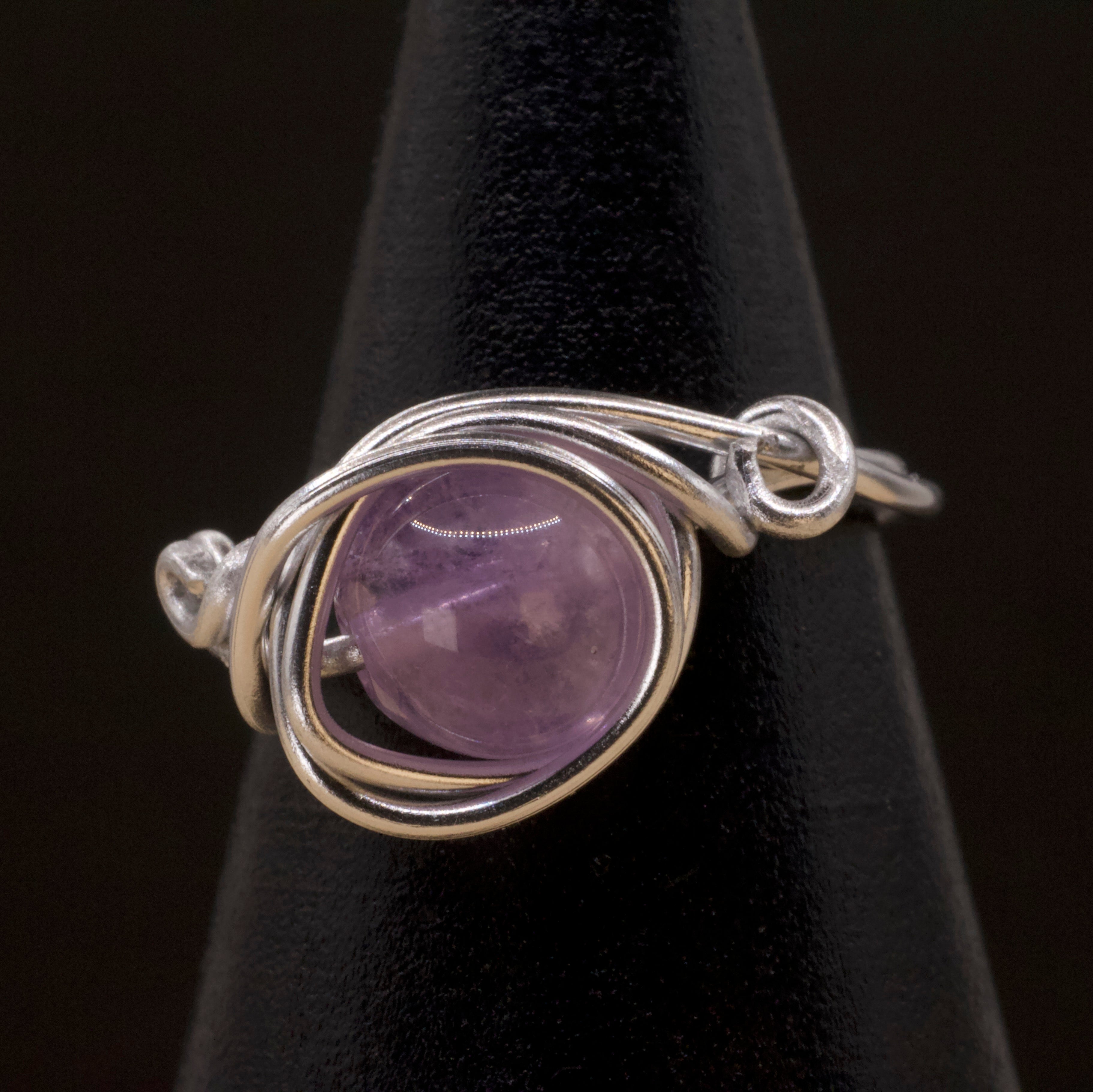 Anello in ametista lavanda | intreccio argento chiaro