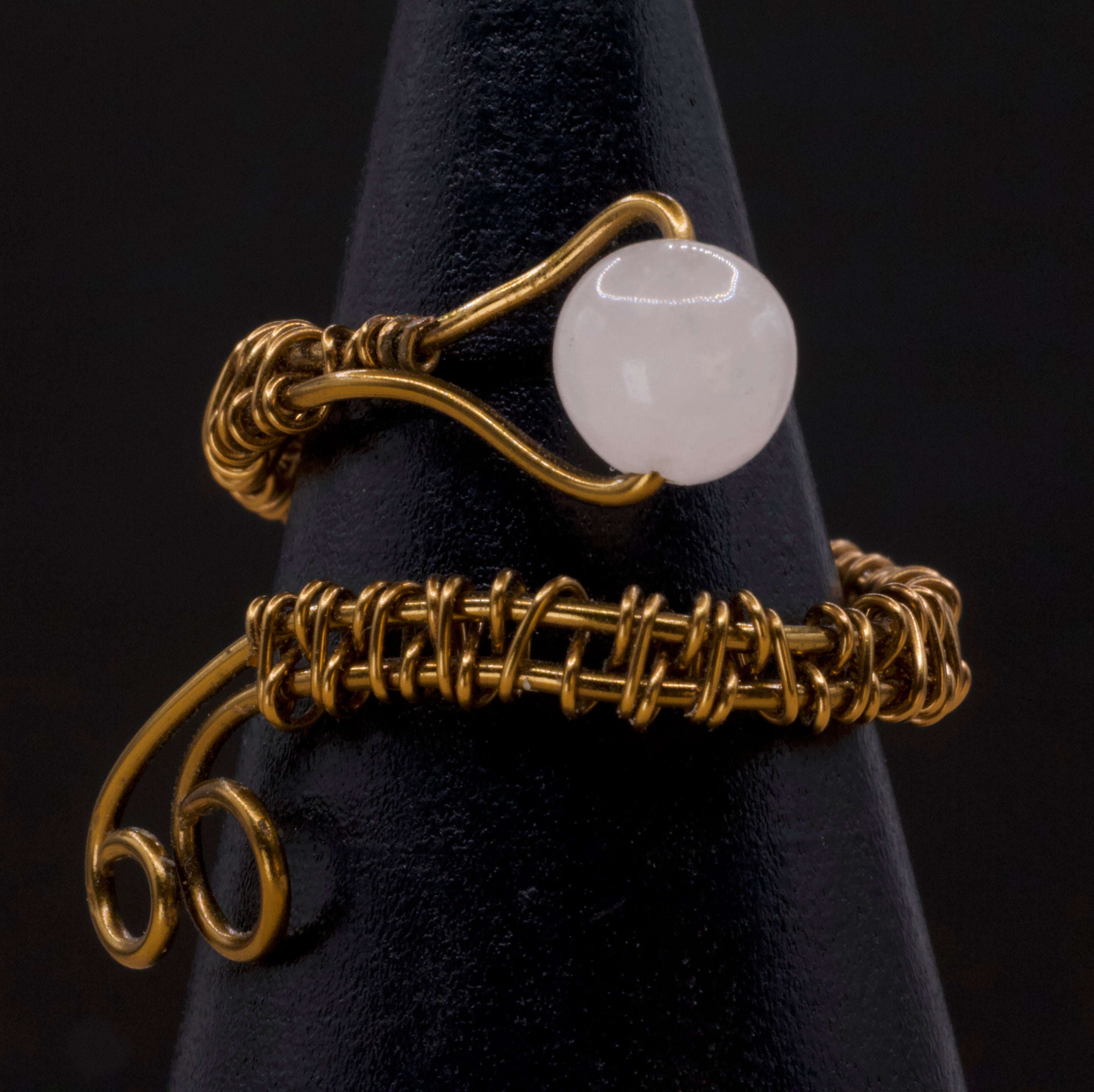 Anello in quarzo rosa | intreccio in rame anticato