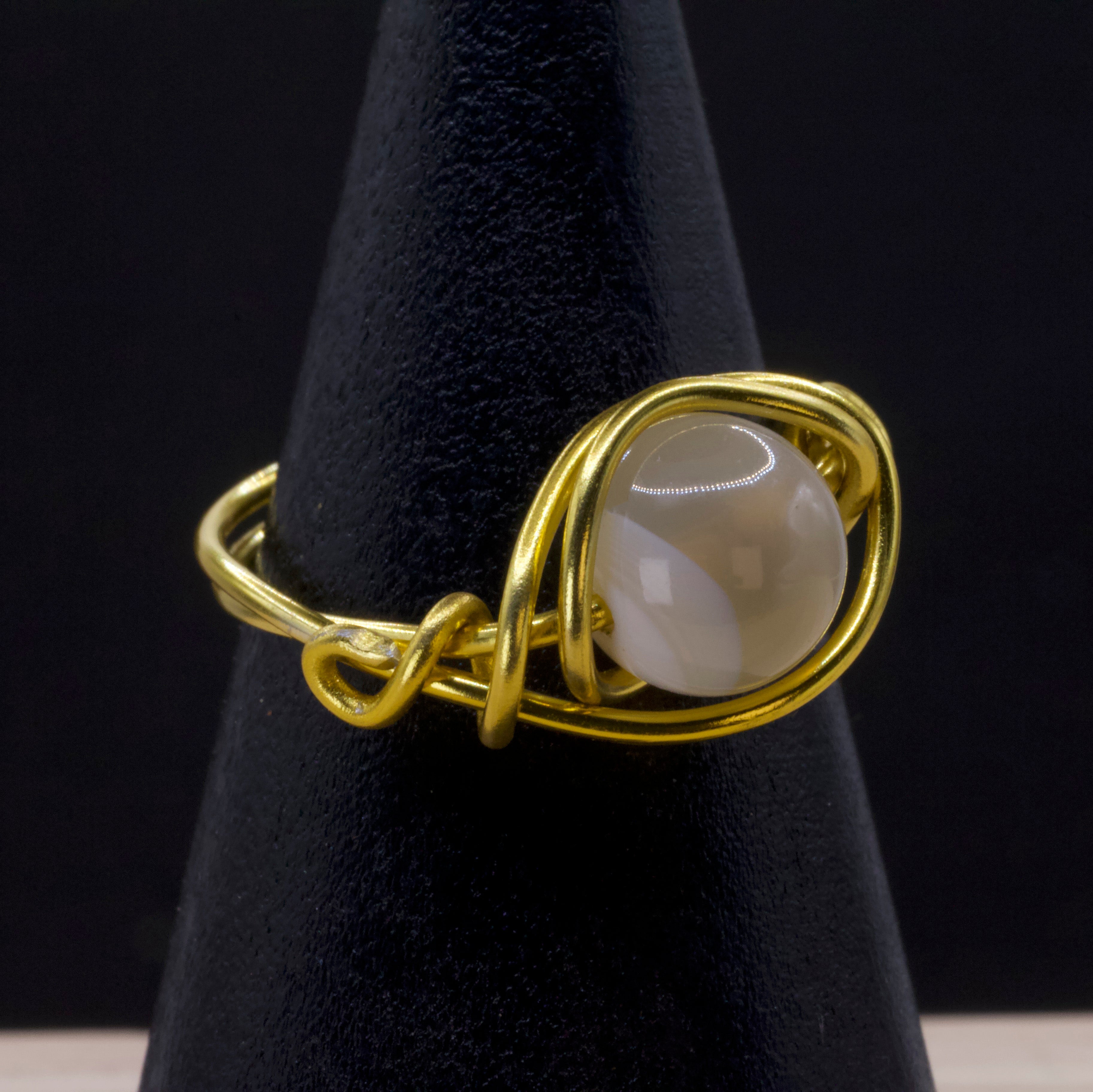 Anello in agata Botswana | filo dorato intrecciato