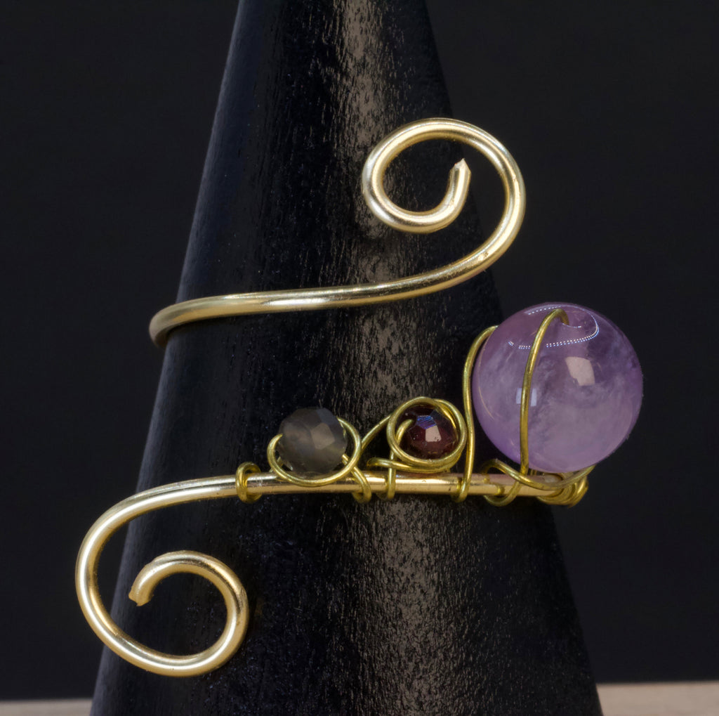 Anello in ametista, granato e quarzo fumé | spirale dorata