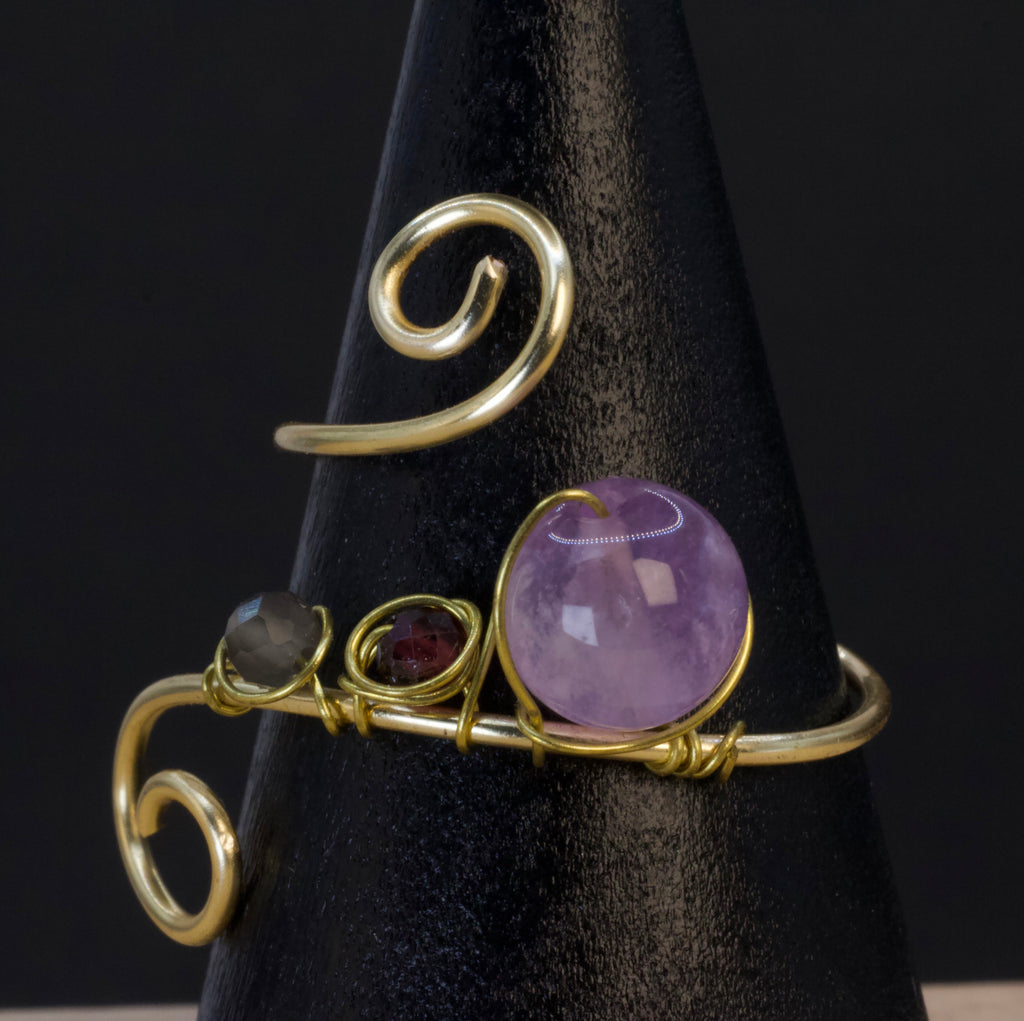 Anello in ametista, granato e quarzo fumé | spirale dorata