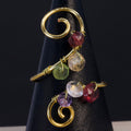 Anello in peridoto, quarzo citrino, granato e ametista | spirale multigemma