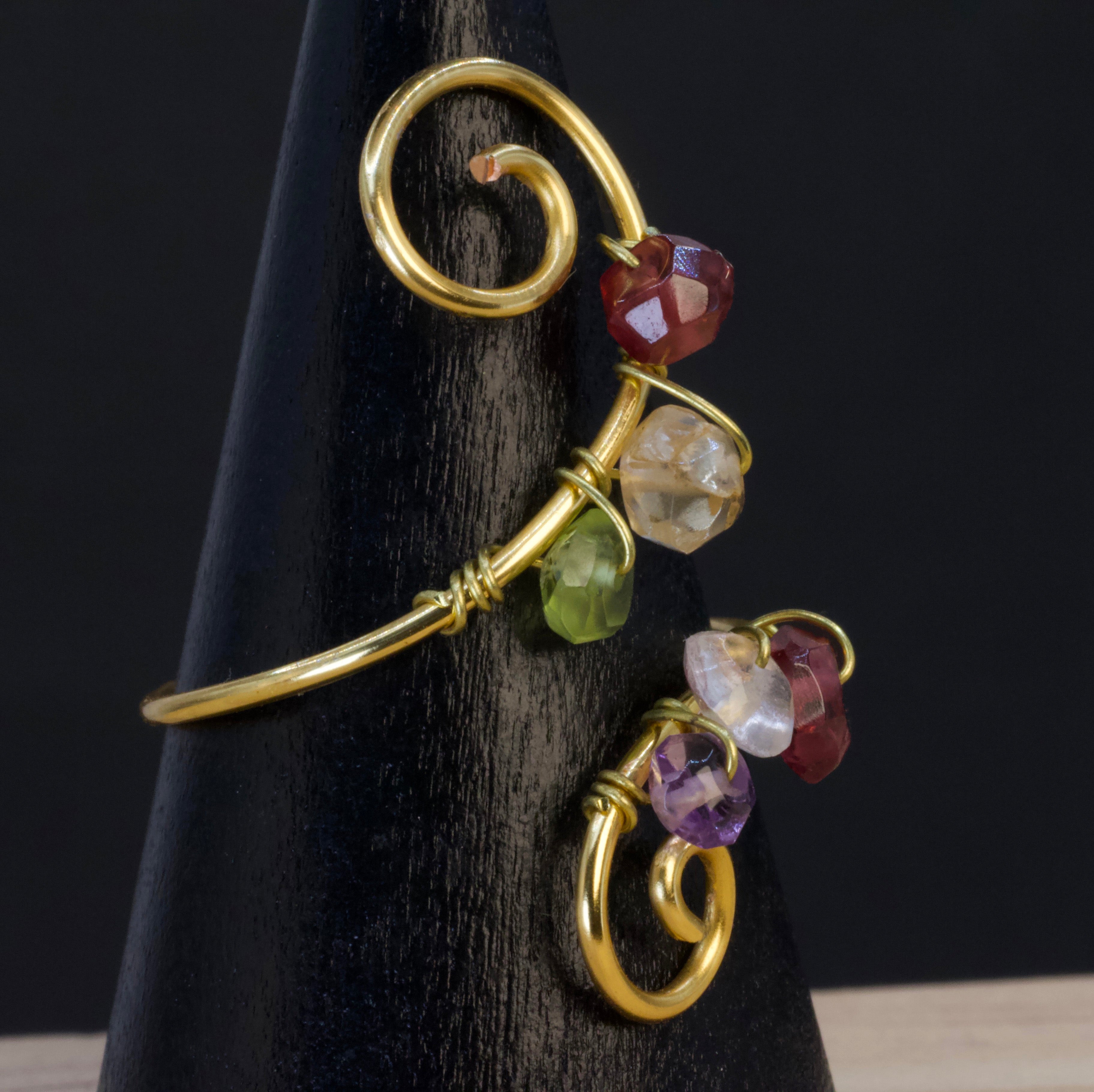 Anello in peridoto, quarzo citrino, granato e ametista | spirale multigemma