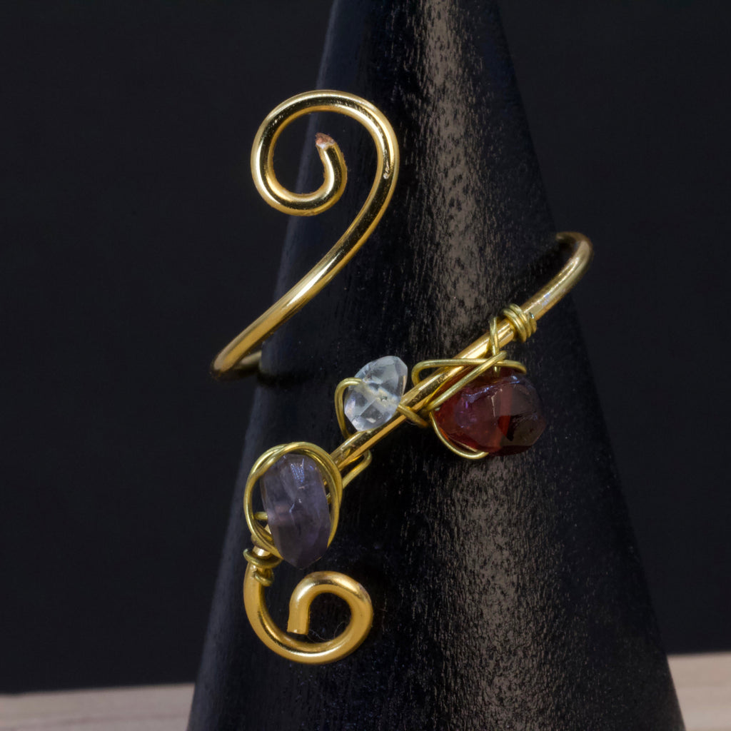 Anello in ametista, acquamarina e granato