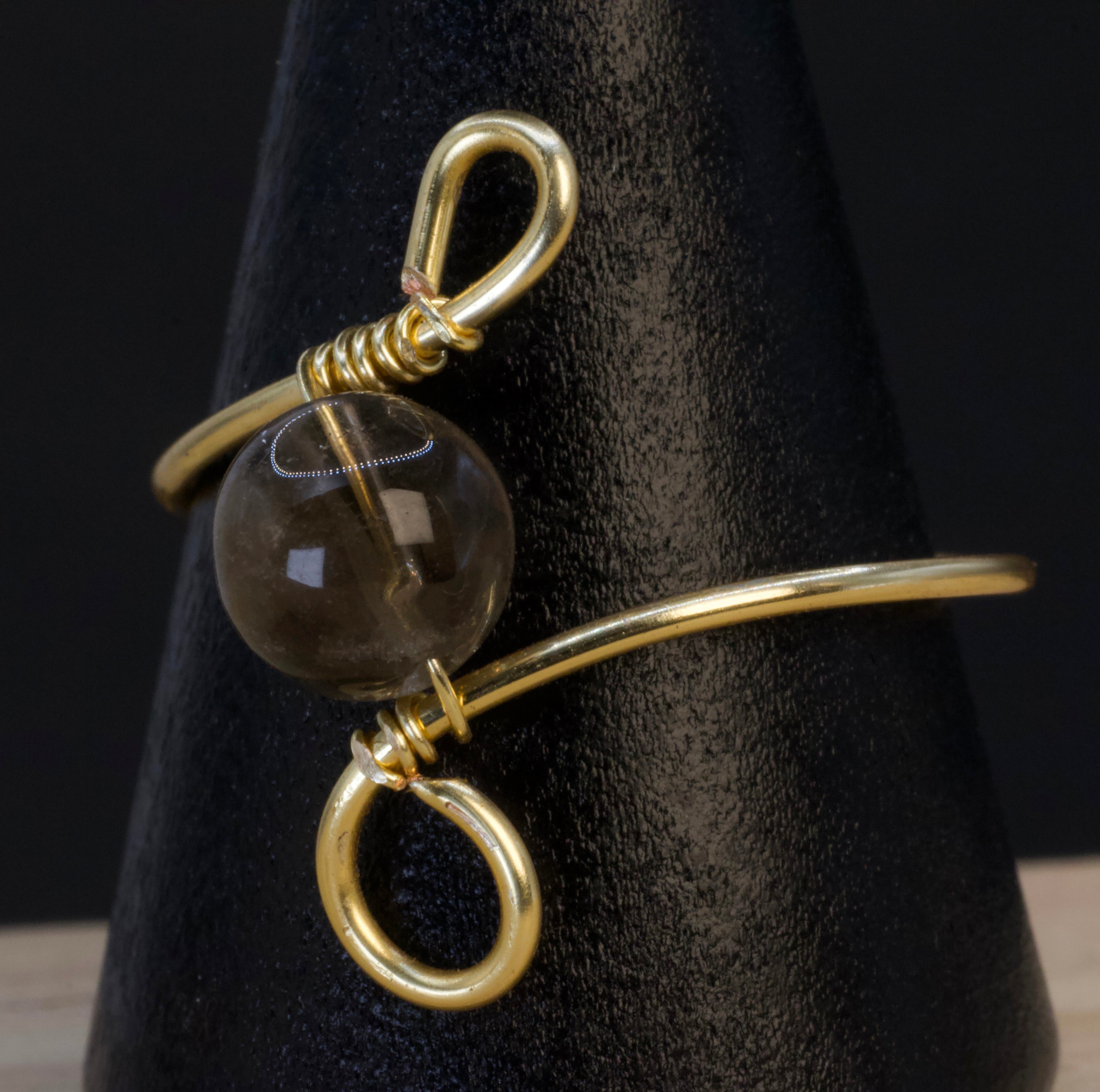 Anello in quarzo fumé | spirale dorata essenziale