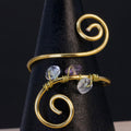 Anello in quarzo ialino, acquamarina e ametista | spirale dorata leggera